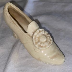 White miniature shoe with flower design